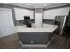Well-equipped kitchen boasting stainless steel appliances and granite countertops at 1508 W 16Th St, Sanford, FL 32771