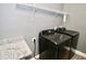 Modern laundry room with Samsung washer and dryer and convenient shelving at 1508 W 16Th St, Sanford, FL 32771