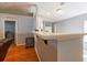 Kitchen bar area is adjacent to the living room and provides extra seating at 15733 Switch Cane St, Clermont, FL 34711