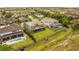 Aerial view of backyard featuring well-maintained lawn and in-ground pool at 16689 Broadwater Ave, Winter Garden, FL 34787