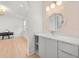 Bright bathroom adjacent to a bedroom with a unique vanity and ample space at 16689 Broadwater Ave, Winter Garden, FL 34787