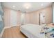 Bedroom featuring walk-in closet and en-suite bathroom at 16689 Broadwater Ave, Winter Garden, FL 34787