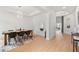 Elegant dining room with modern lighting, a sleek table, and a decorative rug, creating a stylish ambiance at 16689 Broadwater Ave, Winter Garden, FL 34787