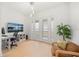 Inviting home office space with French doors, natural light, and views of the serene outdoors at 16689 Broadwater Ave, Winter Garden, FL 34787