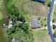 Aerial shot of property highlighting the home's proximity to the lake and lush greenery at 16752 Caravaggio Loop, Montverde, FL 34756