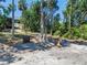 Sandy beach area with lounge chairs, perfect for relaxation at 16752 Caravaggio Loop, Montverde, FL 34756