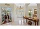 Bright, spacious foyer with decorative lighting at 16752 Caravaggio Loop, Montverde, FL 34756