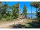 Path to the lake, perfect for leisurely strolls and enjoying the beautiful waterfront at 16752 Caravaggio Loop, Montverde, FL 34756