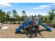 Community playground offers a fun space for to play with slides, climbing structures, and swings at 17411 Million Lakes Ct, Clermont, FL 34714