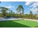 Well maintained backyard features a pool and putting green at 18721 Seaview St, Orlando, FL 32833