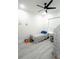 Bright bedroom featuring a single bed, ceiling fan, and neutral decor at 18721 Seaview St, Orlando, FL 32833