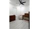 Serene Bedroom with a wooden crib, changing table, and recliner at 18721 Seaview St, Orlando, FL 32833