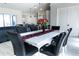 Open-concept dining room featuring a large table with seating for six at 18721 Seaview St, Orlando, FL 32833