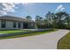 Back exterior view of home featuring putting green and fenced in pool at 18721 Seaview St, Orlando, FL 32833