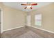 Cozy bedroom with carpet floors, ceiling fan, and neutral walls at 2311 Whitley Ln, Winter Haven, FL 33881
