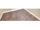 Close up of neutral carpet with white baseboards at 2311 Whitley Ln, Winter Haven, FL 33881