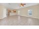 Living space with tiled floors, open floor plan and ample natural light at 2311 Whitley Ln, Winter Haven, FL 33881