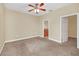 Spacious main bedroom with carpet floors and attached ensuite bathroom at 2311 Whitley Ln, Winter Haven, FL 33881