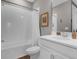 Bathroom featuring a tub with shower, white vanity, and neutral walls at 3029 High Pointe St, Clermont, FL 34711