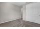 Neutral bedroom features a closet and carpeted floors at 3029 High Pointe St, Clermont, FL 34711