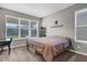 Bright bedroom with carpet flooring, large windows, and comfortable furnishings at 3029 High Pointe St, Clermont, FL 34711