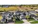 Two-story home with lush landscaping, a paver driveway, and a two-car garage at 3029 High Pointe St, Clermont, FL 34711