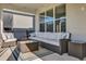 Inviting covered patio with comfortable seating and stylish decor at 3029 High Pointe St, Clermont, FL 34711