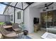Inviting outdoor patio area features seating and a ceiling fan for comfortable lounging at 3173 Riverboat Way, Oviedo, FL 32765