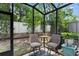 Comfortable screened-in patio with seating area, offering a relaxing outdoor space at 3173 Riverboat Way, Oviedo, FL 32765