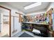Basement featuring pegboard and wooden work table for all of your handy-Personal needs at 320 Isabella Dr, Longwood, FL 32750