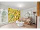 Inviting bedroom with a daybed, colorful wall art, and a bright window at 320 Isabella Dr, Longwood, FL 32750