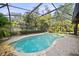 Screened-in pool surrounded by brick patio pavers at 320 Isabella Dr, Longwood, FL 32750