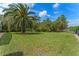 View of the expansive lawn, mature trees, and landscaping of this meticulously maintained property at 3340 Fernlake Pl, Longwood, FL 32779