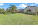 Expansive backyard with lush lawn and a beautiful pool area, ideal for outdoor entertaining at 3340 Fernlake Pl, Longwood, FL 32779