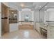 Bright bathroom with a glass shower, soaking tub, and vanity with a dedicated makeup station at 3340 Fernlake Pl, Longwood, FL 32779
