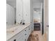 Bathroom features a double sink vanity with marble countertop at 3340 Fernlake Pl, Longwood, FL 32779