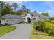 Beautiful single-story home with a three-car garage and well-manicured landscaping at 3340 Fernlake Pl, Longwood, FL 32779