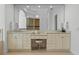 Luxury main bathroom with double vanity sinks, granite countertops, and decorative mirrors at 3340 Fernlake Pl, Longwood, FL 32779