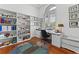 Bright office with a large window and a bookshelf at 3340 Fernlake Pl, Longwood, FL 32779