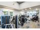Well-equipped gym with cardio machines, weight equipment, and views of the community at 345 Aquamarine Way, Daytona Beach, FL 32124