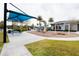 A fun playground area with swings and slides, complemented by a picnic area with a shade structure at 345 Aquamarine Way, Daytona Beach, FL 32124