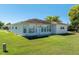 Well-maintained exterior featuring a manicured lawn and a charming single-story home design at 3748 Innisbrook Dr, Lakeland, FL 33810