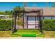 Golf practice net for honing your swing, with synthetic turf ensuring year-round usability and convenience at 3748 Innisbrook Dr, Lakeland, FL 33810