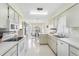 Bright kitchen with tile floors, ample counter space, and stainless appliances at 3748 Innisbrook Dr, Lakeland, FL 33810