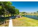 Lakeside park featuring picnic areas, a scenic pathway, and a peaceful atmosphere for community gatherings at 3748 Innisbrook Dr, Lakeland, FL 33810