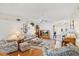 Cozy living area featuring hardwood floors, a ceiling fan, and an open layout at 3748 Innisbrook Dr, Lakeland, FL 33810