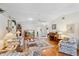 Well-lit living room with hardwood floors, comfortable seating, and open floor plan at 3748 Innisbrook Dr, Lakeland, FL 33810