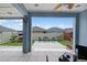 Covered patio features tiled floors and view of the backyard, furniture, and vinyl fence at 434 Ironside Trail Dr, Groveland, FL 34736