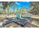 A playground located on a lush lawn provides a perfect area for fun and recreation at 442 Troon Cir, Davenport, FL 33897
