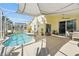 This screened-in pool offers a private and relaxing outdoor space, perfect for enjoying the Florida weather at 442 Troon Cir, Davenport, FL 33897